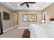 Cozy bedroom with neutral walls, wall art and a ceiling fan at 10660 Winding Pine Pt, Highlands Ranch, CO 80126
