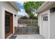 Charming backyard space with privacy fence, landscaping, and fire pit, ideal for outdoor entertaining at 1385 Birch St, Denver, CO 80220