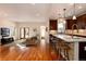Bright and airy living room with hardwood floors, modern furniture, and access to the backyard at 1385 Birch St, Denver, CO 80220