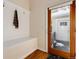 Cozy mudroom with a built-in bench and storage, perfect for entryway organization at 1385 Birch St, Denver, CO 80220