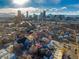 Property location shown with city skyline in the distance at 2431 N Ogden St, Denver, CO 80205