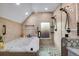 Bathroom featuring a large bathtub and walk-in shower with tile surround at 2431 N Ogden St, Denver, CO 80205