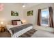 Charming bedroom with neutral tones, carpet floors, and natural light at 2431 N Ogden St, Denver, CO 80205
