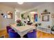 Open dining room featuring a decorative table and hardwood floors and open concept floor plan at 2431 N Ogden St, Denver, CO 80205