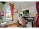 Cozy office nook with a desk, natural light, and warm design accents at 2431 N Ogden St, Denver, CO 80205