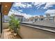 Inviting balcony with potted plants and city views at 1717 Irving St, Denver, CO 80204