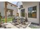 Outdoor patio with table and chairs, ideal for relaxation or entertaining at 1717 Irving St, Denver, CO 80204