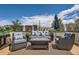 Rooftop deck with comfortable seating and blue skies at 1717 Irving St, Denver, CO 80204