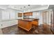 Finished basement bar area with cabinets and granite countertop at 13686 Dexter St, Thornton, CO 80602