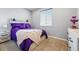 Stylish bedroom featuring a bright window and a unique nightstand creates a charming space at 13686 Dexter St, Thornton, CO 80602