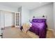 Cozy bedroom features a queen-sized bed and bright natural light at 13686 Dexter St, Thornton, CO 80602