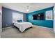 Cozy bedroom featuring a ceiling fan and a TV for comfortable relaxation and entertainment at 13686 Dexter St, Thornton, CO 80602