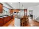 Modern kitchen with granite countertops, stainless steel appliances, and a center island with seating at 13686 Dexter St, Thornton, CO 80602