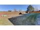 Large backyard featuring a wooden privacy fence, and well-kept lawn at 10169 Briargrove Way, Highlands Ranch, CO 80126