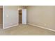 Neutral bedroom with beige carpet and a closet for storage at 10169 Briargrove Way, Highlands Ranch, CO 80126