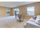 Living room featuring large windows for natural light at 10169 Briargrove Way, Highlands Ranch, CO 80126