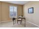 Cozy home office space with desk, chair, and natural light at 10169 Briargrove Way, Highlands Ranch, CO 80126