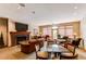 Cozy gathering space with fireplace, comfortable furniture, and ample seating at 2700 E Cherry Creek S Dr # 302, Denver, CO 80209