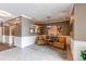 Comfortable seating in lobby area shows neutral paint, chandelier and decor at 2700 E Cherry Creek S Dr # 302, Denver, CO 80209