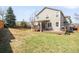 Spacious backyard featuring a covered patio and a deck along with a stained wood privacy fence at 5174 W 123Rd Pl, Broomfield, CO 80020