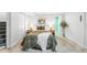 Inviting basement bedroom with wood floors, modern decor, and ample closet space at 5174 W 123Rd Pl, Broomfield, CO 80020