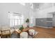 Spacious living room featuring hardwood floors, neutral walls, and ample natural light at 5174 W 123Rd Pl, Broomfield, CO 80020