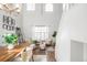 Bright open-concept living space featuring hardwood floors and modern decor at 5174 W 123Rd Pl, Broomfield, CO 80020