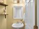 Stylish powder room with floating shelf, attractive vanity and modern fixtures at 5174 W 123Rd Pl, Broomfield, CO 80020