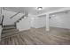 Spacious finished basement with stairs, vinyl flooring and ample room for multiple uses at 3715 N Jackson St, Denver, CO 80205