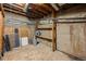 Unfinished basement room with exposed concrete walls and open ceiling at 3715 N Jackson St, Denver, CO 80205