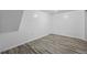 Basement bedroom featuring vinyl flooring, window, and ample room for furniture and storage at 3715 N Jackson St, Denver, CO 80205