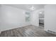 Bright living room with laminate floors and natural light at 3715 N Jackson St, Denver, CO 80205