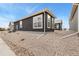 Modern home exterior with gravel landscaping at 308 Josef Cir, Fort Lupton, CO 80621