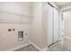 Laundry room area with washer-dryer hookups and storage space at 308 Josef Cir, Fort Lupton, CO 80621