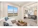 Cozy living room with comfortable seating and ample natural light at 308 Josef Cir, Fort Lupton, CO 80621