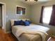 Comfortable bedroom showcasing a well-made bed, and a cozy atmosphere perfect for relaxation and rest at 9180 Spruce Mountain Rd, Larkspur, CO 80118