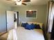 Inviting bedroom boasts a comfortable bed, soft lighting, and a calming color scheme at 9180 Spruce Mountain Rd, Larkspur, CO 80118