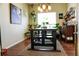 Features dining table and hanging plants, illuminated by natural light from the window at 541 Park Blvd, Brighton, CO 80603