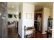 Inviting entryway with hardwood floors and decor, leading to an open living space at 541 Park Blvd, Brighton, CO 80603