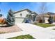 Charming single-Gathering home with an attached garage and a well-manicured front yard at 541 Park Blvd, Brighton, CO 80603