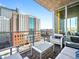 Relaxing balcony featuring outdoor seating and expansive views of the city at 891 14Th St # 1109, Denver, CO 80202