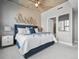 Comfortable bedroom featuring a ceiling fan, modern décor, and an open doorway at 891 14Th St # 1109, Denver, CO 80202