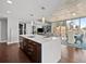 Contemporary kitchen with island, stainless steel appliances and open floor plan at 891 14Th St # 1109, Denver, CO 80202