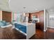 Modern kitchen featuring an island with seating and stylish blue accents at 891 14Th St # 1109, Denver, CO 80202