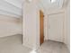 Entryway features tile floor and coat closet at 800 W Belleview Ave # 201, Englewood, CO 80110