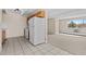 Kitchen with tile floor, updated cabinets and appliances at 800 W Belleview Ave # 201, Englewood, CO 80110