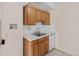 Kitchen features updated cabinets, countertops and appliances at 800 W Belleview Ave # 201, Englewood, CO 80110