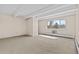 Living room with large window at 800 W Belleview Ave # 201, Englewood, CO 80110