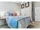 This bedroom offers a plush bed, neutral walls, and ample closet space at 566 N Humboldt St, Denver, CO 80218