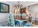 Charming dining area with decorative chairs, a classic chandelier, and tasteful wall decor at 566 N Humboldt St, Denver, CO 80218